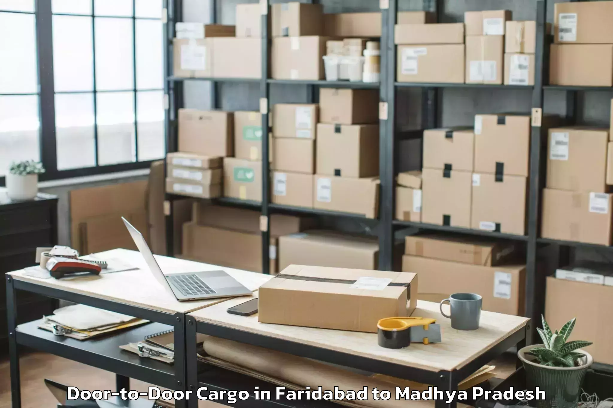 Efficient Faridabad to Khategaon Door To Door Cargo